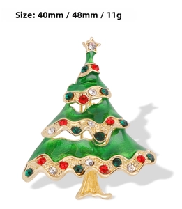 Detail of Christmas tree brooch with green enamel and rhinestones 40mm x 48mm size