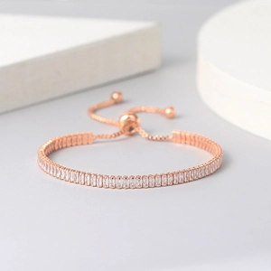 Adjustable rose gold bracelet with rectangular cubic zirconia and a slide clasp mechanism
