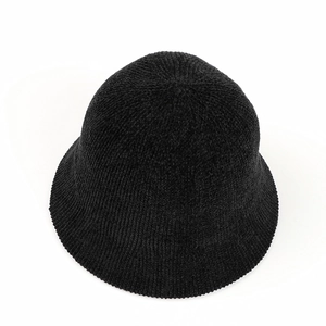 Detailed view of the thick black chenille knit texture on a winter bucket hat