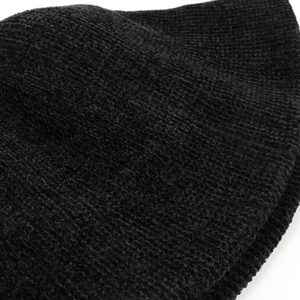 Macro shot of black chenille knit bucket hat texture with thick honeycomb weaving