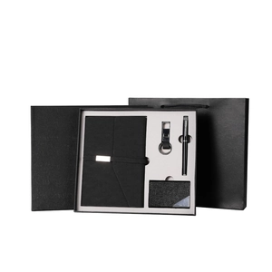 Business gift set including black leather notebook, pen, keychain and card holder with box