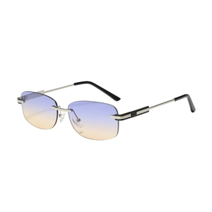 Fashion rimless sunglasses with purple to yellow gradient lenses and silver metal details