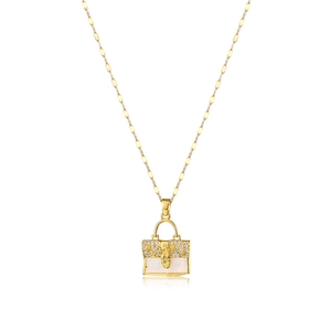 Gold handbag necklace with sparkling crystal details and white mother-of-pearl inlay