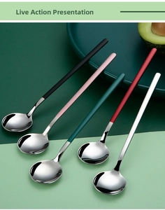 Set of five 304 stainless steel long handle spoons with colorful matte grips on a plate