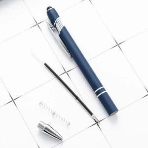 Blue retractable ballpoint stylus pen with disassembled ink refill and metal parts