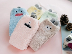 Set of five colorful coral fleece warm socks with cute monster embroidery and soft 3D horns