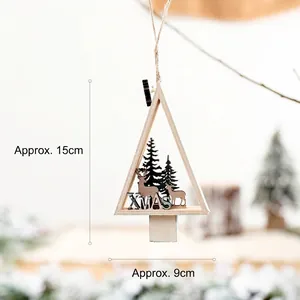 Detail of wooden XMAS star ornament with laser-cut reindeer and pine tree design