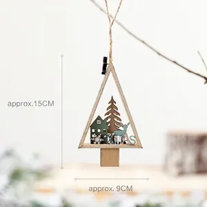 Detail of wooden Christmas tree ornament with carved reindeer and forest, 15x9cm size
