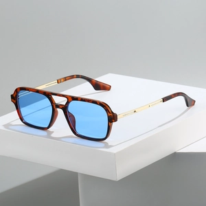 Retro double-bridge aviator sunglasses with tortoiseshell frame and blue lenses