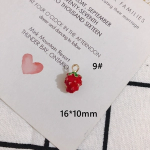 Detailed view of red strawberry alloy pendant charm for DIY jewelry making 16x10mm