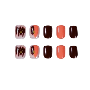 Short square burgundy press-on nails set with gold foil and marble smudge effect