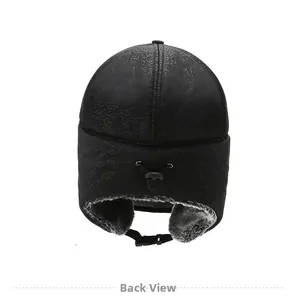 Back view of black winter trapper hat with unique marble texture and warm gray faux fur lining