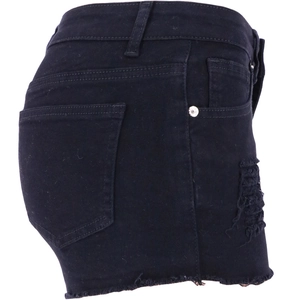 Detail of black denim shorts with ripped side cut-outs and raw hem edge texture
