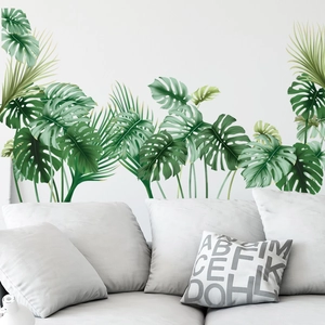 Self-adhesive monstera leaf wall stickers for a modern tropical living room decor