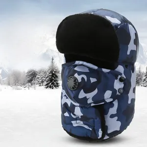 Detail of camouflage trapper hat featuring a breathable valve mask and thick faux fur lining