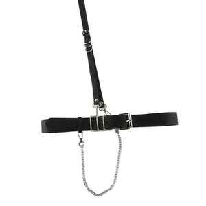 Women's punk black leather body harness belt with silver metal rings and hanging chains