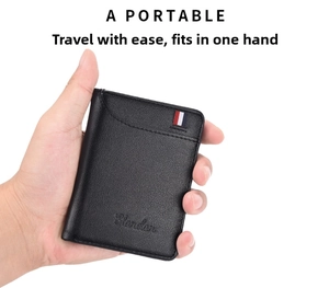 Slim black leather card holder with tricolor ribbon detail and textured finish