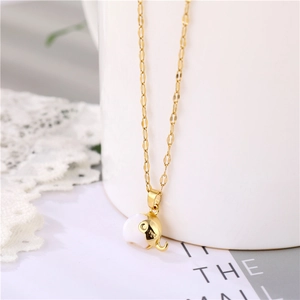 Golden elephant necklace with white mother-of-pearl inlay on a minimalist chain
