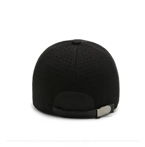 Detail of winter baseball cap back featuring honeycomb texture and adjustable leather strap