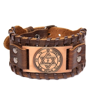 Vintage brown leather bracelet featuring a bronze hexagram plate with Nordic runes
