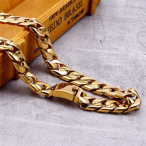 Detail of 18K gold plated stainless steel Cuban link chain with square press clasp
