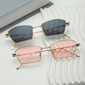 Modern irregular geometric metal sunglasses with unique pentagonal lenses and arrow accents