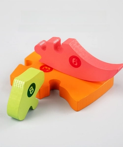 Macro shot of smooth rounded edges and numbered colorful wooden puzzle block details