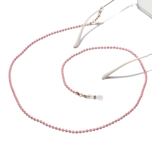 Detailed spiral view of pink beaded sunglasses chain with golden lobster clasps and loops