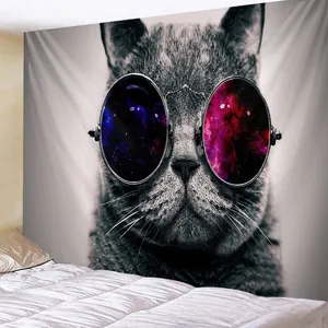 Detail of a punk cat tapestry with galaxy sunglasses displayed over a modern bedroom bed