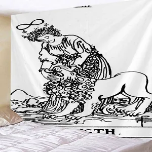 Detail view of monochrome Strength Tarot tapestry hung on a cozy bedroom wall