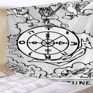 Detail of black and white Tarot Wheel of Fortune wall tapestry hanging above a bed