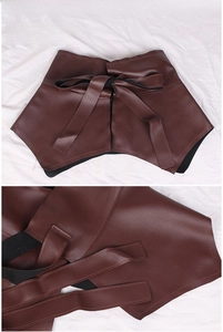 Close-up of brown PU leather corset belt with stylish front lace-up bow and ruffle hem
