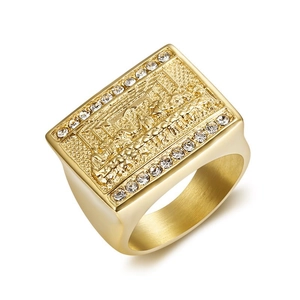 Gold square signet ring with The Last Supper relief and white zircon stones on white background