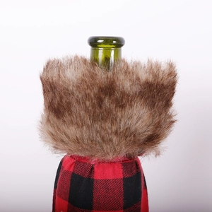 Red and black plaid Christmas wine bottle cover with faux fur collar and drawstring ties