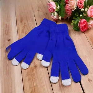 Detailed knit texture of blue touch screen gloves with white conductive fingertips