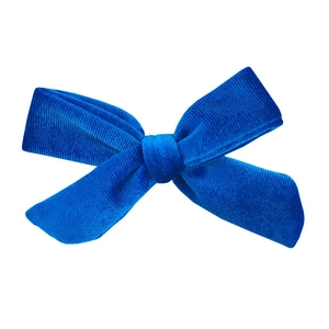 Detailed view of royal blue velvet handmade bow knot hair accessory with soft texture
