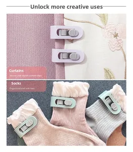 Detail view of purple and green clips used for securing curtains and organizing socks
