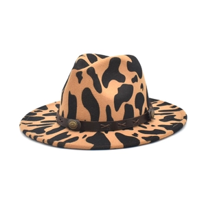Detail of leopard print wool fedora with brown leather band and vintage metal buckle