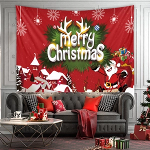Detail of Bohemian Christmas wall tapestry with Merry Christmas text and festive village scene