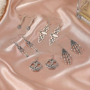 5-piece vintage silver Halloween earring set featuring skeletons, bats, and spiders