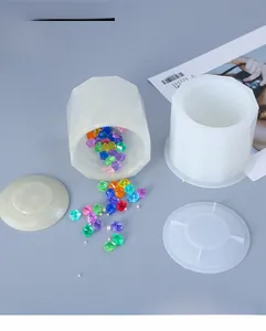Detailed view of geometric cylinder storage box silicone mold with lid for DIY resin casting