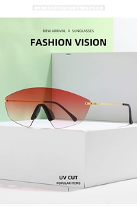 Detail of trendy shield sunglasses with red-brown gradient lenses and metal temples