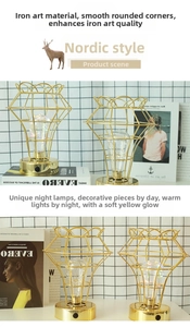 Detail of gold geometric diamond LED iron table lamp with warm filament lighting