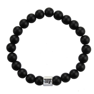 Detail of 8mm matte black bead bracelet with silver Virgo zodiac sign charm