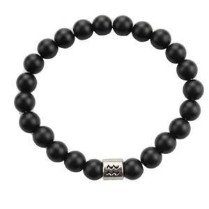 Macro view of 8mm matte stone beads and silver Aquarius zodiac charm on bracelet