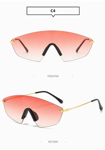 Detail view of pink gradient frameless oversized sunglasses with slim gold metal temples