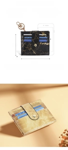 Detail view of marble pattern card holder with snap button and size comparison with phone