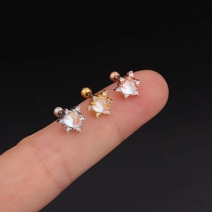 Star-shaped stainless steel ear studs with opal and zircon in gold, silver and rose gold