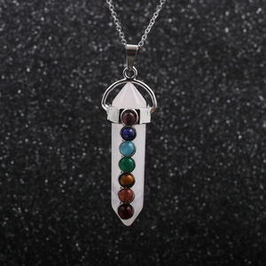 Chakra necklace featuring a white quartz hexagonal pendant with seven healing stones