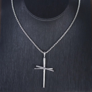 Silver stainless steel baseball bat cross pendant necklace on black display stand